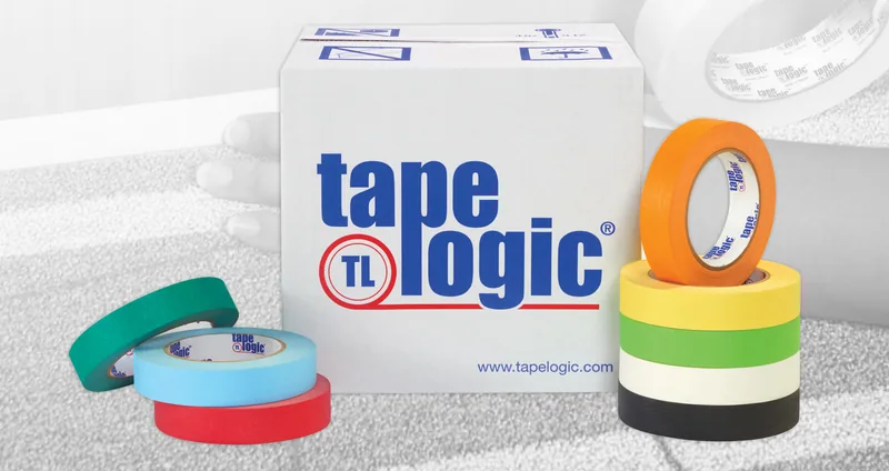 Colored masking tape rolls in front of a Tape Logic case