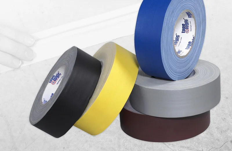 Gaffers tape rolls in black, yellow, blue, gray and brown